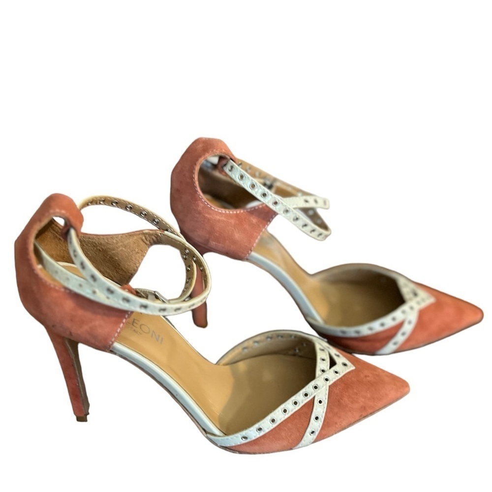 Napoleoni beautiful rust orange colored heels with cream trim at front. Size 7.